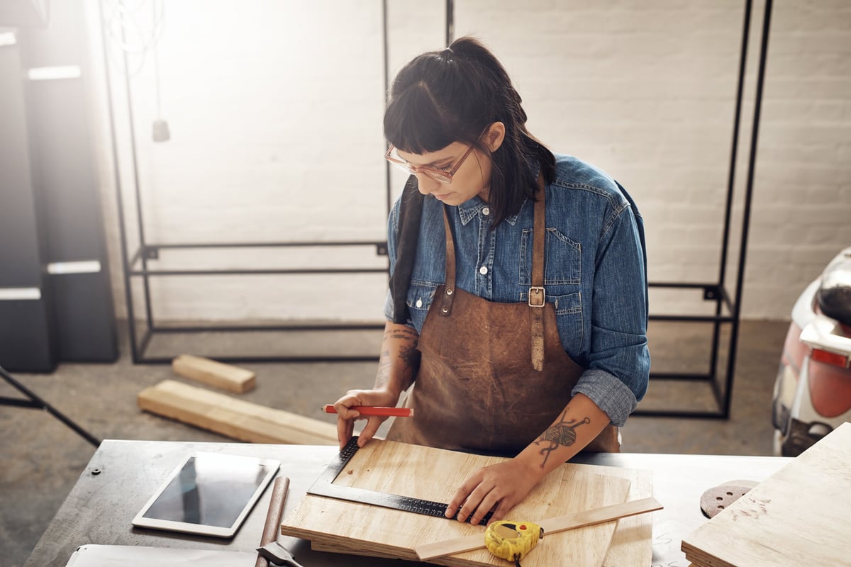 Cropped shot of an attractive young woman working in her creative workshop